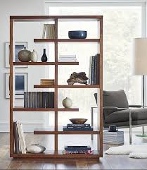Living room furnishings include a shallow love seat and a small bistro set. Room Divider Ideas Crate And Barrel Living Room Divider Living Room Partition Design Room Partition Designs