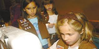 Girl Scouts make care packages for troops