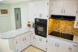 At the beginning of both projects, a service provider will safely remove all cabinet fronts, doors and hardware, leaving only the frame on the walls. Kitchen Update Under 1000 Checking In With Chelsea