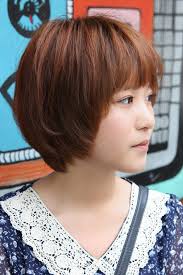 Nail this hairstyle by keeping your hair sleek and smooth. Cute Korean Short Haircut Layered Bob With Feathered Ends Fringe Hairstyles Weekly