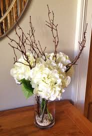Fake Hydrangea Floral Arrangement With Twigs Set In Still Water Fake Flower Centerpieces Flower Decorations Dining Room Centerpiece