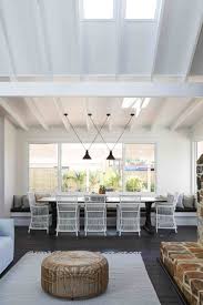 Large Windows And A Long Bench Seat Look Great In This Open Plan Living Room Home Home Decor Room
