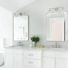 Luckily, the sharp marble look that makes up the backsplash and vanity countertop isn't overshadowed. Curved Marble Bathroom Vanity Backsplash Design Ideas