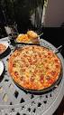 Giuseppes Bar & Grille | Las Vegas | A supreme pizza that lives up ...