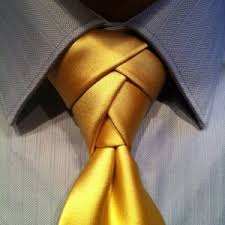 After take the wide end and pass it through the neck loop. How To Tie An Eldredge Necktie Knot Agreeordie