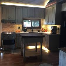 Denver's most exquisite kitchens are on offer at the kitchen showcase. Fabulous Denver Distressed Black Kitchen Cabinets Rustic Kitchen Butcher Block Black Walnut Silestone Countertop Rev A Shelf Copper Sink Knotty Alder