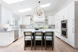 The back of the cabinets is sloped because—so is the ceiling. Kitchen Hood On Sloped Ceiling Design Ideas