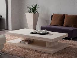 The dana coffee table is the perfect balance between intricate pattern and organic lines. Low Stone Coffee Table