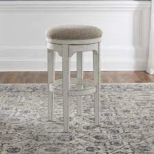 It features a comfy scoop seat and multiple stretchers for a comfortable seating experience. Liberty Furniture Magnolia Manor Dining Cottage Style Swivel Barstool With Upholstered Seat Zak S Home Bar Stools