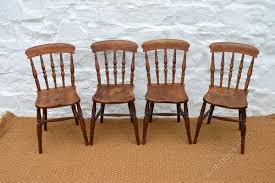A True Set Of Four 19th Century Elm And Ash Farmhouse Dining Chairs Of The Most Beautiful Form Featuring A Rare T Farmhouse Dining Chairs Chair Dining Chairs