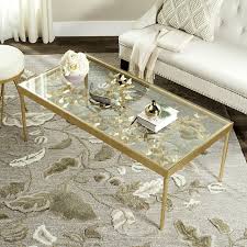 Ethereal and timeless, this modern heirloom antique gold finish and sculptural detail bring visual splendor to any décor. Safavieh Home Collection Rosalia Antique Gold Butterfly Coffee Table Buy Online In Andorra At Andorra Desertcart Com Productid 123649504