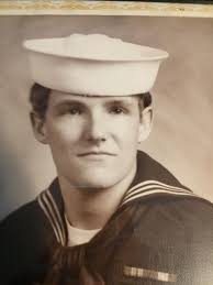 Veterans sharing photos and experiences in uniform