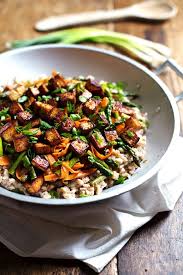I like to serve it on a bed of rice with stir fried vegetables, or even sliced in sandwiches. Honey Ginger Tofu And Veggie Stir Fry Recipe Pinch Of Yum
