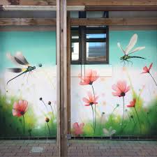Garden Mural Painted In A Hospital Outdoor Area By Graffiti Artist Peaceful Progress Based In Cardiff Featuring Dragon Flies An Mural Wall Art Mural Mural Art