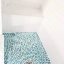 Get free shipping on qualified bathroom, blue, mosaic tile or buy online pick up in store today in the flooring department. Check Out Our Penny Round Clean Sky And Imperial Bianco Subway Tile In This Blue And White Serene Sho Penny Round Tile Bathroom Mosaic Bathroom Tile Penny Tile