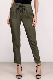 Make A Statement In The Debby Olive Green Satin Pants Featuring A Drawstring Detail Dress Up With A B Womens Dress Pants Military Green Pants Pants For Women