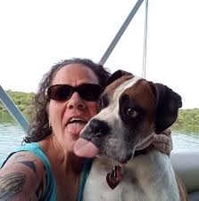 How to stop a boxer dog from licking its paws due to allergies?