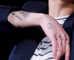 The Most Searched Tattoo On Pinterest Belongs To Which K Pop Idol Kpopmap Bts Tattoos Kpop Tattoos Hand Tattoos