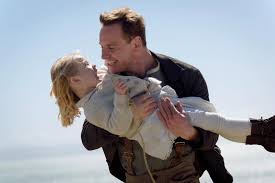 Tom Sherbourne Michael Fassbender Holds The Child Lucy Florence Clery In The Light Between Oceans The Light Between Oceans Michael Fassbender Michael