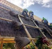 Artificial fire-resistant palm thatch roofing material