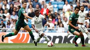 In madrid, karim benzema (real betis balompie) gets his head to the ball but the strike is cleared by an untiring defence. La Liga Real Madrid End Harrowing Season With 12th League Defeat Losing 2 0 At Home To Real Betis