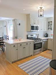It has subtle yellow undertones, making it look rich and creamy. Benjamin Moore Cumulus Cloud Cabinets Painting Kitchen Cabinets New Kitchen Cabinets Grey Kitchen Walls