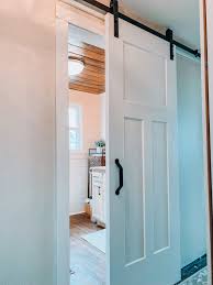 If you have a screen door that always gets banged up or walk through, then you'll want to check it out. A New Sliding Barn Door For Our Bathroom Life On Shady Lane