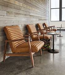 this striking leather accent chair has details you ll appreciate from every angle callan s chair and ottoman modern furniture living room modern lounge chairs