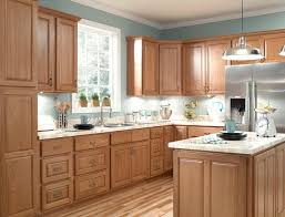 pine cabinets with blue painted walls