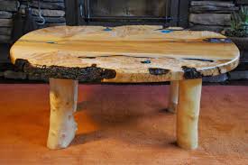 Organic coffee table crafted from a giant slab of ancient big leaf maple burl. Products