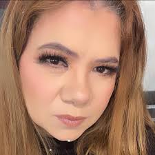 Who are recommended professional photographers in Merced for high school  graduation photos?