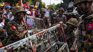 In the near future, a drone pilot is sent into a deadly militarized zone and must work with an android officer to locate a doomsday device. Myanmar Protester Laughing Down The Barrel Of A Gun