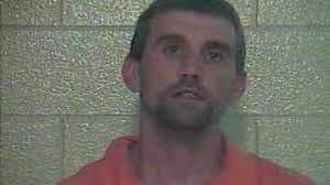 Boyfriend charged with murder in death of woman found in sinkhole