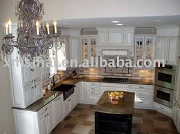 white cabinets, dark tile floor
