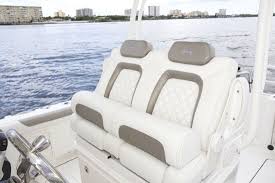 World Cat 295cc Individual Flip Up Bolsters And Flip Down Armrests Highlight The Comfort Features Of The Helm Seat World Cat Boat Accessories Boat Seats