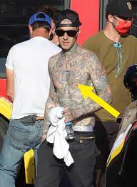 Travis barker's new tattoo and although the post didn't have a caption, kourtney seems to be more than thrilled now that travis is expressing his love with a permanent symbol, including her. Travis Barker Gets Kourtney Kardashian Tattoo