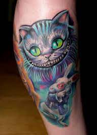 Alice In Wonderland Wonderland Tattoo Alice And Wonderland Tattoos Cheshire Cat Tattoo