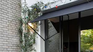 Having trouble getting your awning clean? This Is The Right Way To Do A Door Awning Architectural Digest