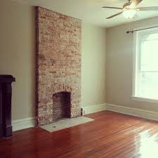 An environmentally efficient wood burning fireplace insert (pro series ci2600) stylish wood log storage and bold tile refinishing. Pin By Sarah Frost On Home Style Exposed Brick Fireplaces White Brick Fireplace Fireplace Remodel