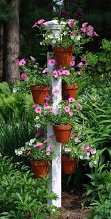 22 Creative Pot Hangers Vertical Garden Vertical Garden Flower Pole Herb Garden Design