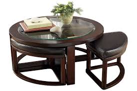 Glass coffee tables show off all your favourite things, while. Marion Coffee Table With Nesting Stools Ashley Furniture Homestore