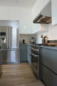 Cuisine Epuree Backsplash Blanc Et Hotte Encastre Maison Angora Terrebonne Kitchen Kitchen Cabinets Home