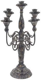 Her dreamy tulle is perfect for creating an unforgettable entrance as you cascade into the room! Rosemary Lane Grey Iron Vintage Candlestick Holders 20x13x13 Reviews Home Macy S Rustic Metal Candle Holders Vintage Candlestick Holders Metal Candle