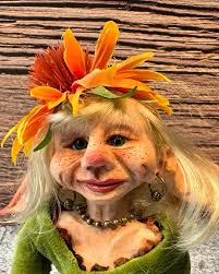 Meet Thalia... She is a flower fairy and a guardian of the forest, Her  supernatural abilities protect plants and flowers from harm, ensuring their  growth and beauty flourish. She holds the elixer "