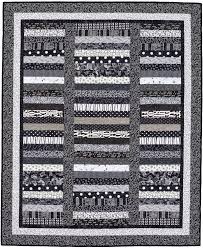 Black And White Quilt Patterns Free Jelly Roll Race Quilt With A Spin Giveaway Stitch This The Martingale Blog Jelly Roll Race Quilt Black And White Quilts Jellyroll Quilts