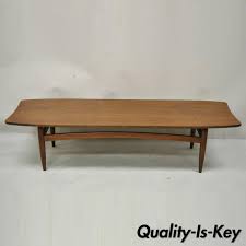 Solid tops and glass tops. Vintage Mid Century Modern Walnut Surfboard Sculptural Long Coffee Table From Vintage Philly Furniture Of Philadelphia Attic