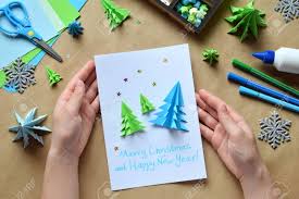 The smilebox card maker helps you create the online greeting card that you desire. Making Greeting Card With Origami 3d Xmas Tree From Paper Merry Christmas And Happy New Year Decoration Children S Diy Concept Handmade Crafts On Holiday With Your Own Hands Stock Photo Picture And