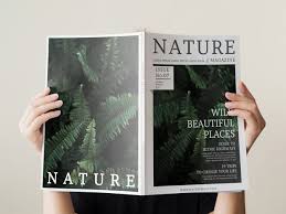 Download Womans Hand Holding A Nature Magazine Mock Up For Free Mockup Magazine Mocking