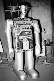 The deka arm's electrodes, which are attached to the muscles of the wearer, transmit signals to a processor in the prosthesis, which then interprets those signals and turns them into up to 10 distinct movements. Royalty Free Stock Photos Illustrations Vector Art And Video Clips Retro Robot Vintage Robots Retro Futurism