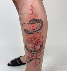 Tenderfoot Tattoo Studio On Instagram Snake Wrapped Around A Snapdragon Flower Done By Sanmartintatto Snapdragon Flowers Flower Tattoo Designs Tattoo Studio